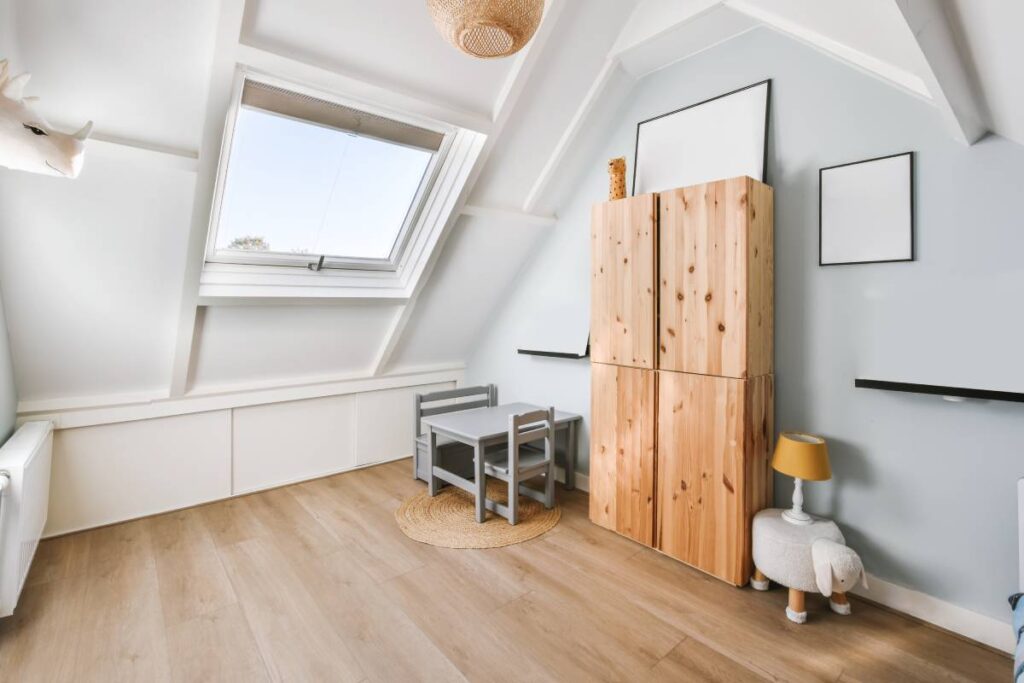 Delightful attic room with wooden floor and skylight