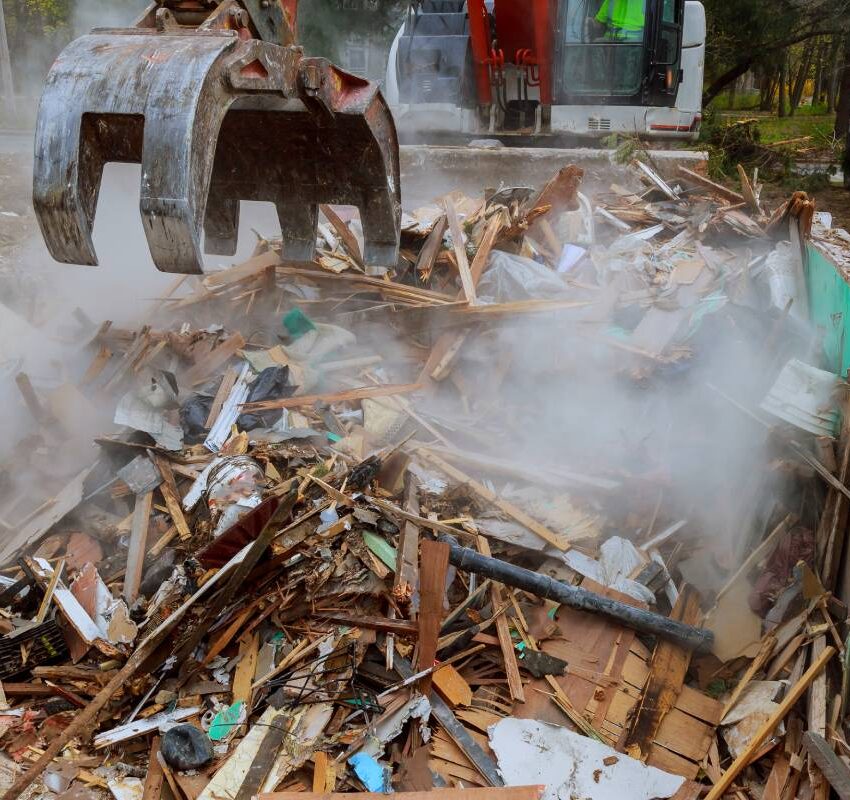 broken house after tragedy excavator disassembles structure tornado